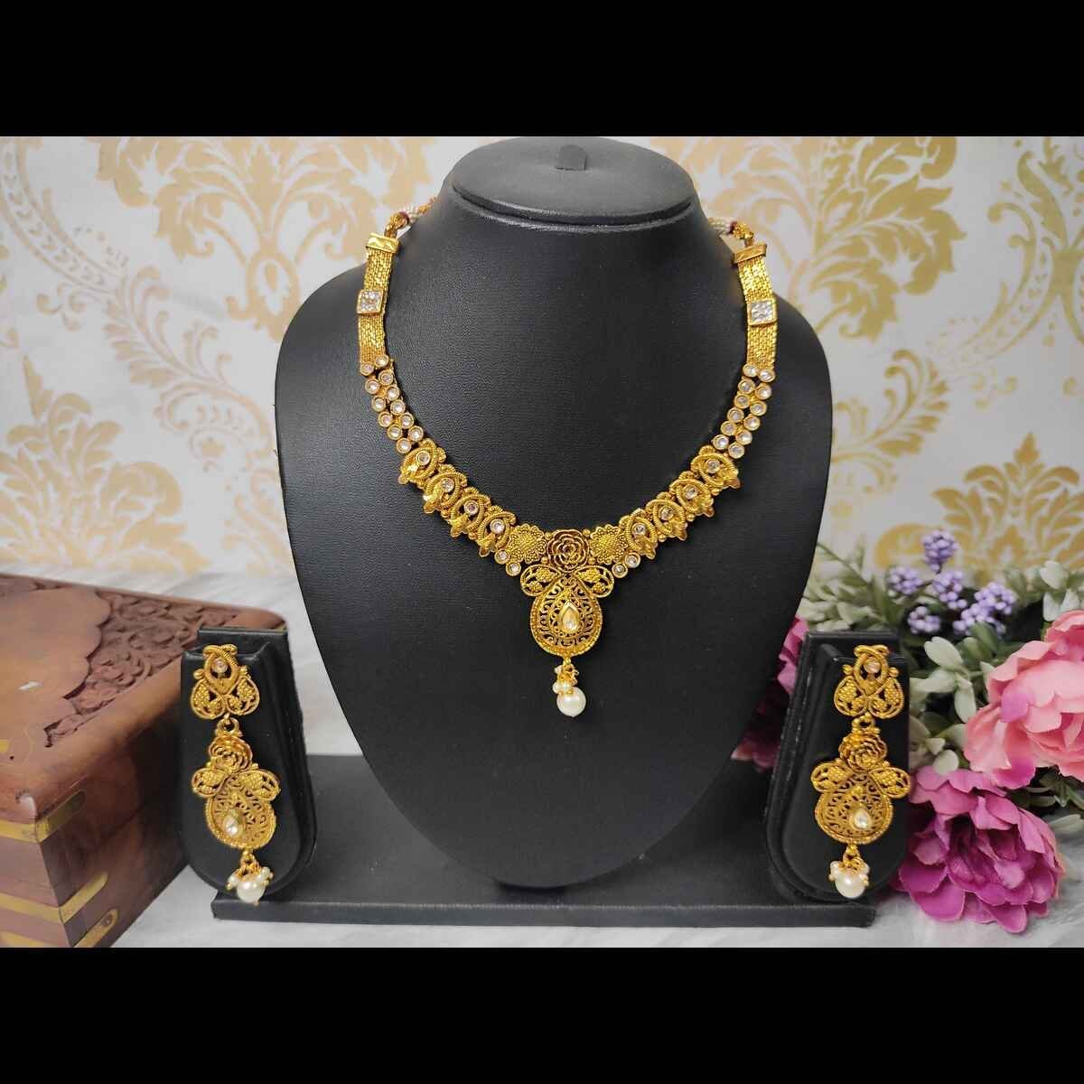 SDG004(1) Latest Trendy Kundan Pearl Gold Plated Necklace and Dangle Earring Jewellery Set - Image 1